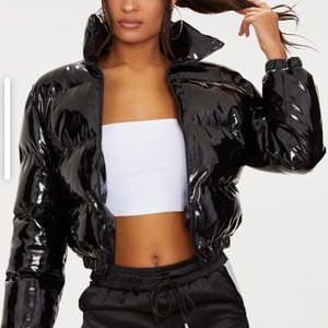 Black puffer coat size 4 worn twice.